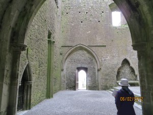 Cashel Cathedral ruins with tourist